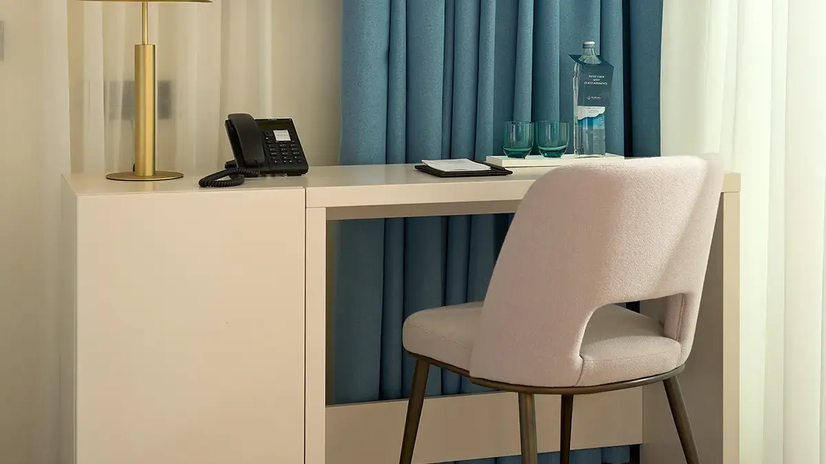 Plush comfortable chair in hotel room of Boutique Hotel Mirari