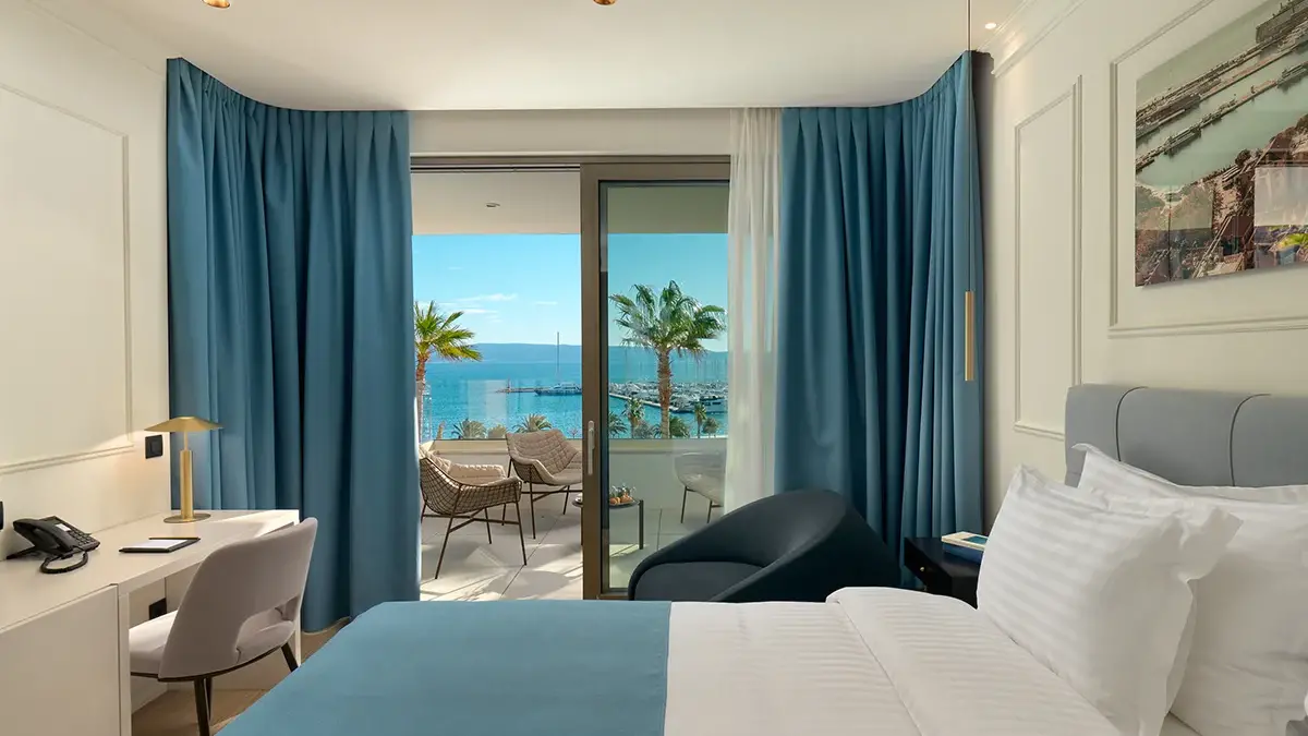 Blue hotel room in Boutique Hotel Mirari with balcony and open sea view
