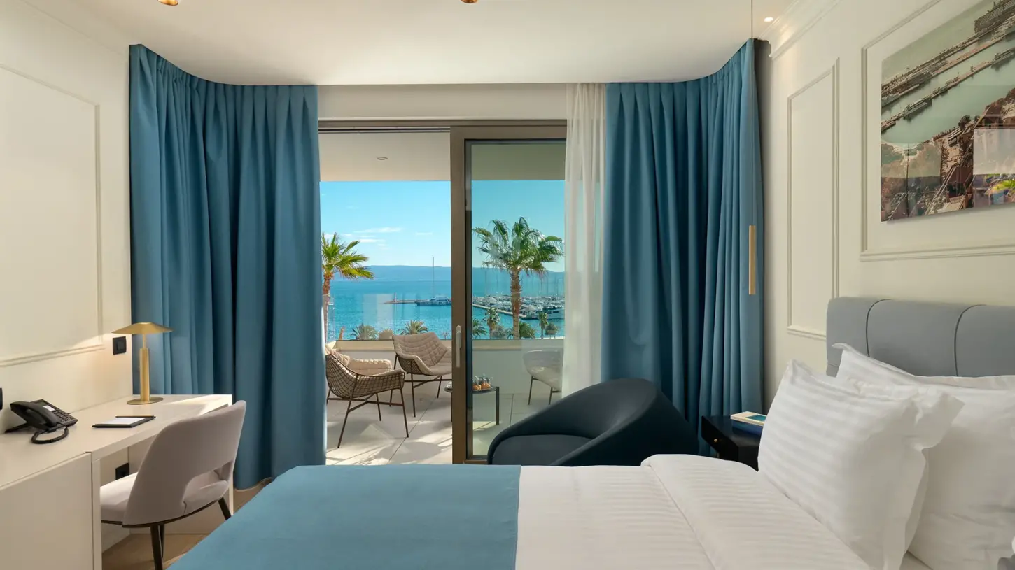 Blue hotel room in Boutique Hotel Mirari with balcony and open sea view